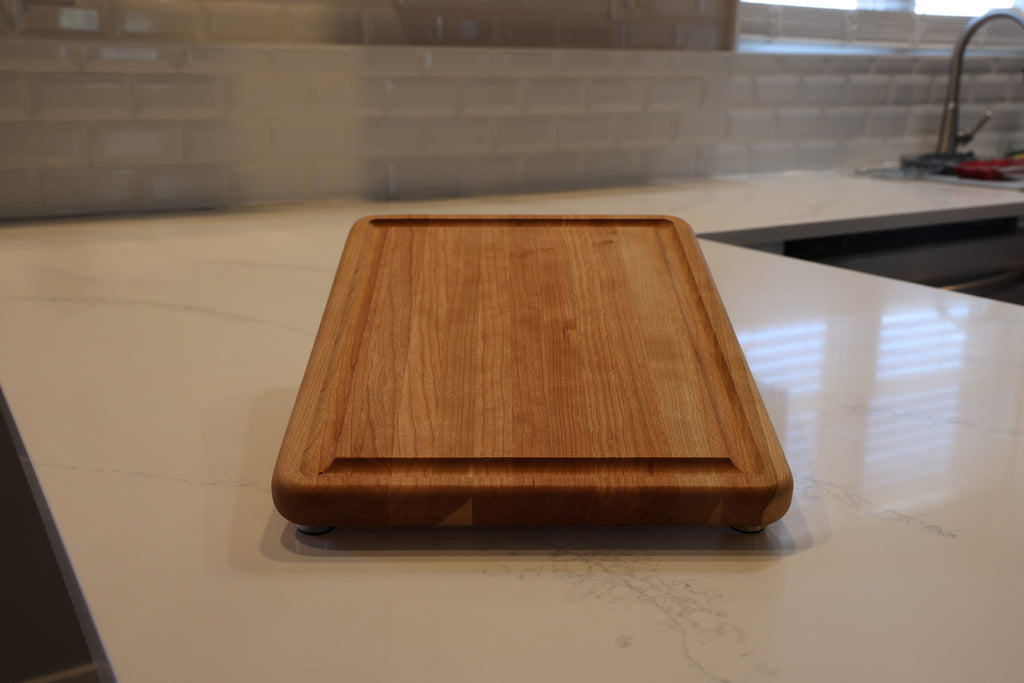 Cherry Edge Grain Cutting Board With Roundover, Juice Groove, & Metal Feet